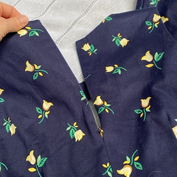 Draper James navy floral sleeveless dress with ruffled hem. - Picture 6 of 12